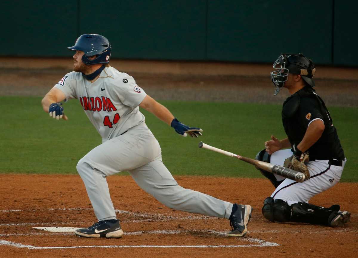 Arizona's Tanner O'Tremba (44) hits against ASU during game one of a series at Phoenix Municipal Stadium. (2021)